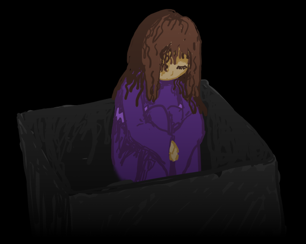 Riley sitting in a box